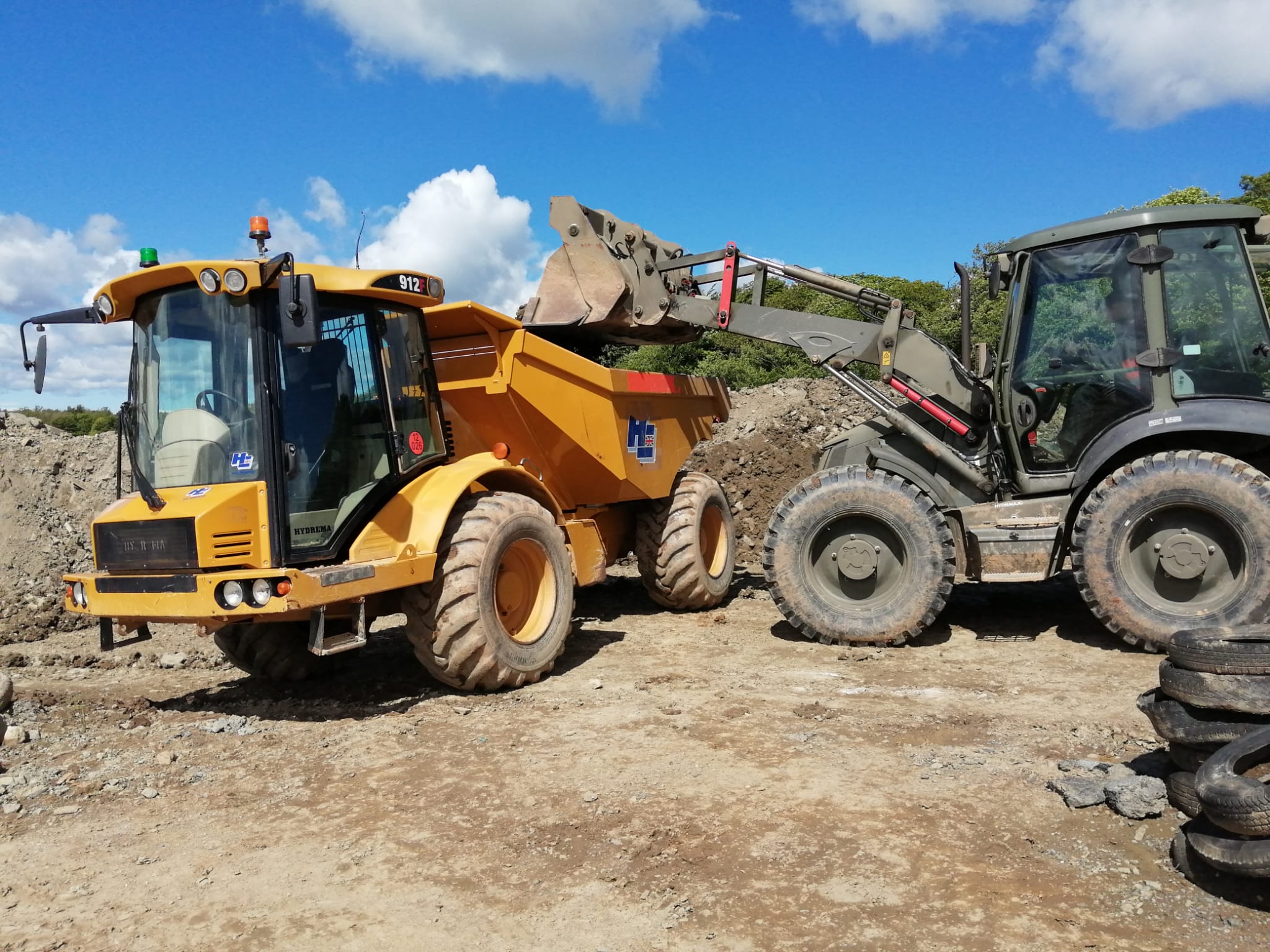 Two construction vehicles on site