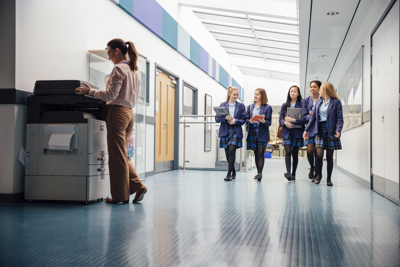 School children walking down a corridor