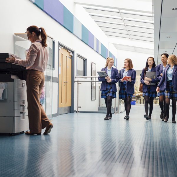 School children walking down a corridor