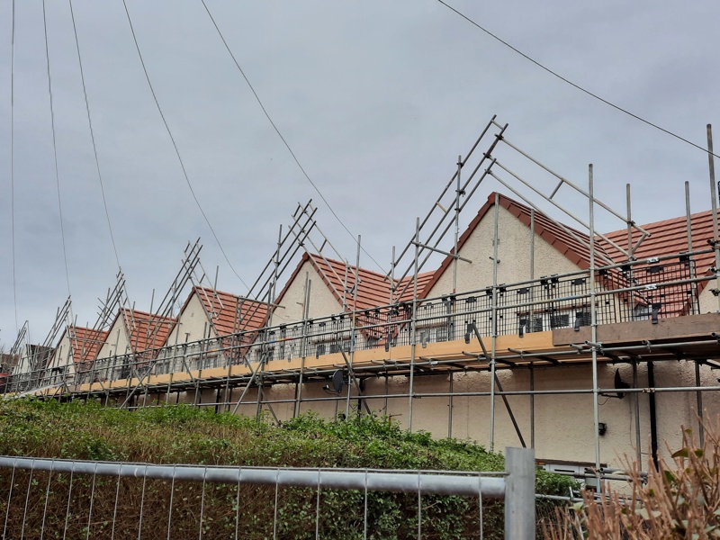 Image of housing with scaffolding.