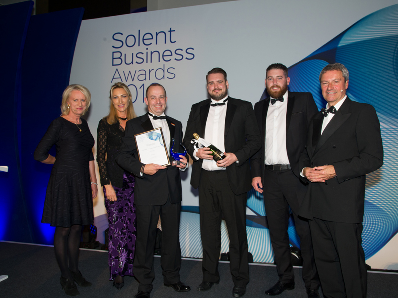 Image of Amey employees in formal attire at the Best Solent awards.