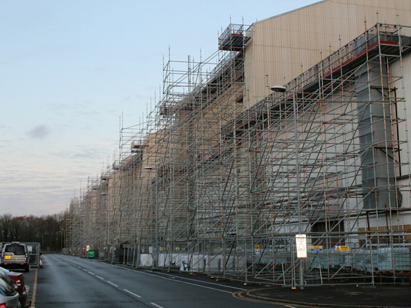Image of a base hangar at Brize Norton surrounded by scaffolding.