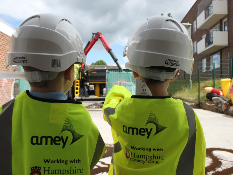 two school pupils wearing Amey PPE.