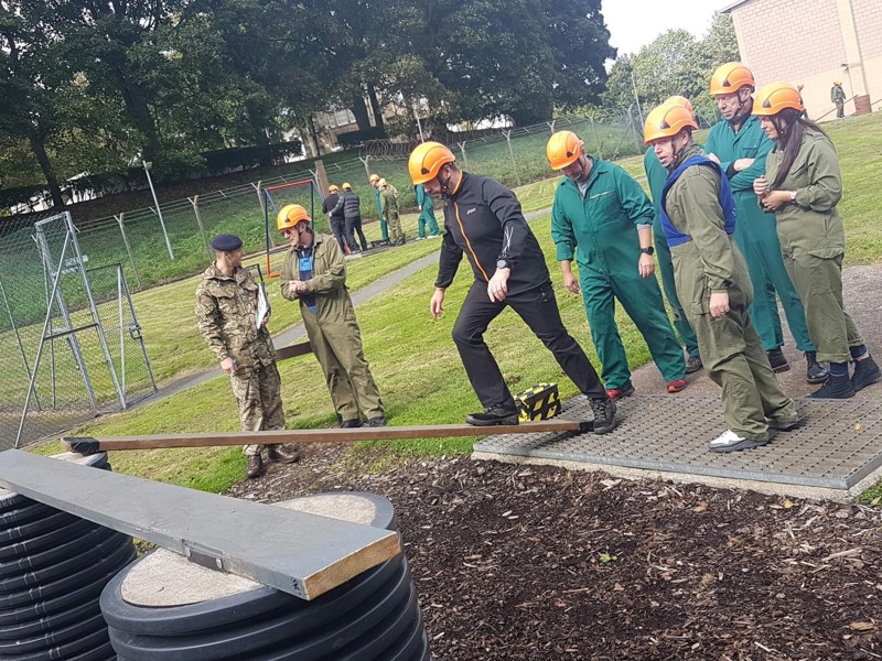 Amey employees carrying out an assault course.
