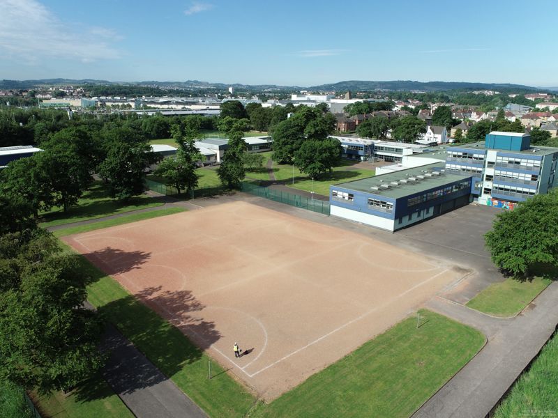 ariel image of tennis courts and buildings.