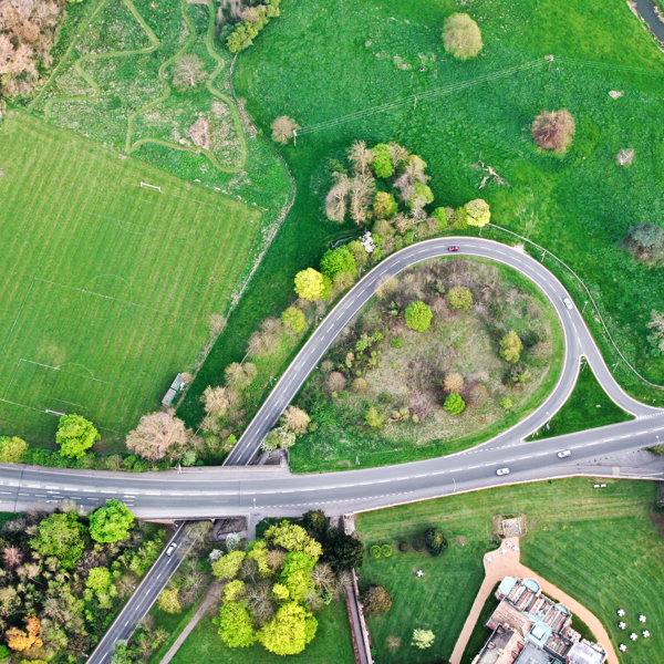 Ariel view of a road surrounded by trees