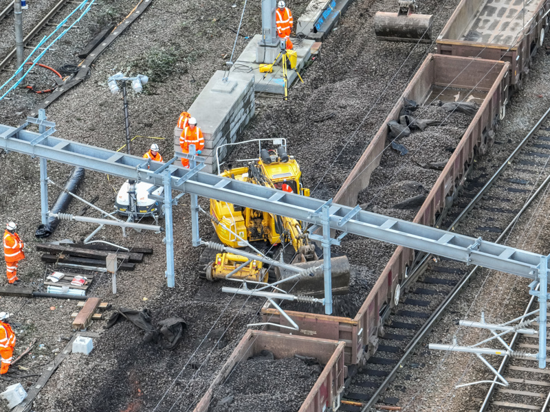 Image of construction work being carried out on a rail track.